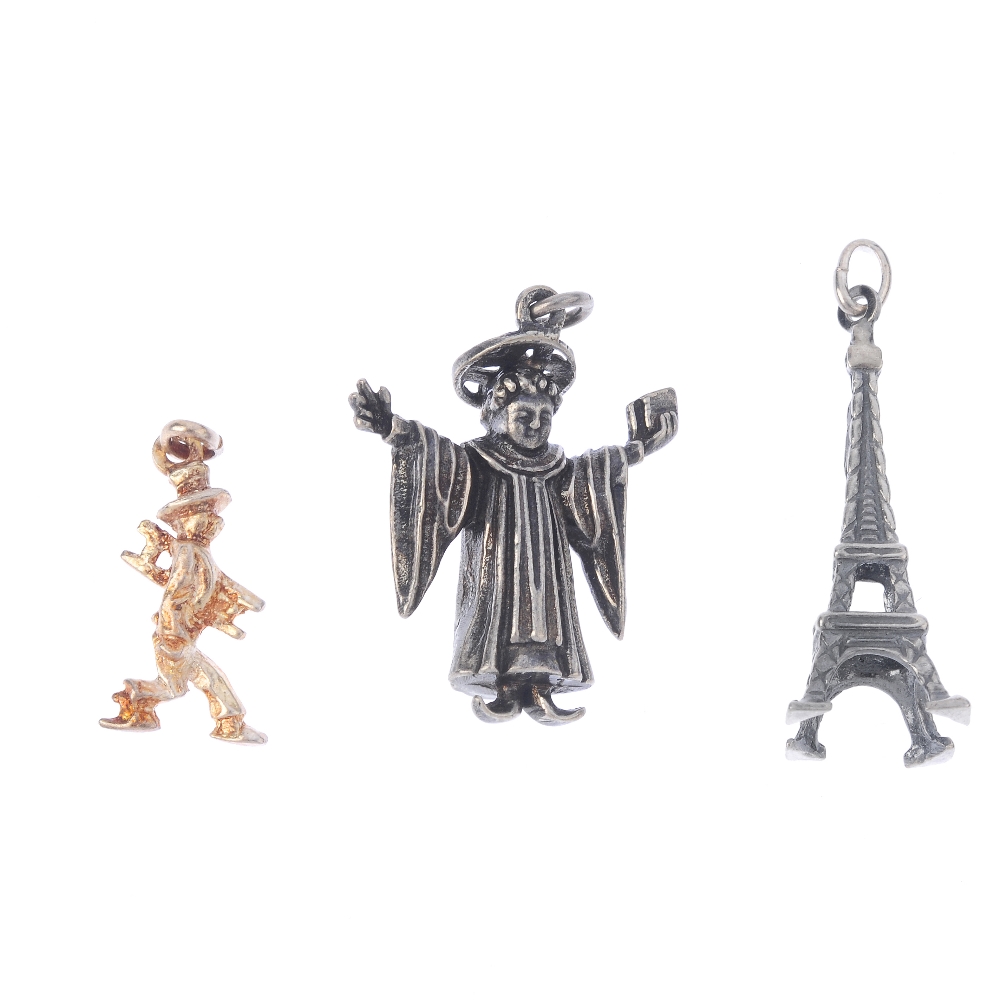 A selection of silver and white metal charms. To include a carriage, a cuckoo clock, multiple