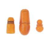 A selection of carved natural amber beads. Many carved in tapered and bulbous designs. Lengths 1