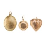 Three lockets. To include an early 20th century 9ct back and front heart-shape locket, with