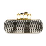 ALEXANDER MCQUEEN - a Nappa Studded Knucklebox clutch. Designed with a hard cased black leather