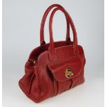 EMPORIO ARMANI - a red leather handbag.