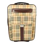 BURBERRY - a rolling suitcase.