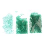 A selection of vari-shape emeralds, to include square, circular and marquise-shapes. Approximate