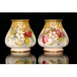 A matched pair of Royal Worcester cache pots,