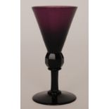 An early 19th Century amethyst thistle bowl wine glass circa 1810,