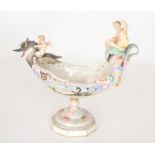 A continental posy basket, the oval basket modelled with a cherub riding a dragon,