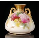 A Royal Worcester Hadleys shape 155 twin handled vase of lobed form decorated with hand painted