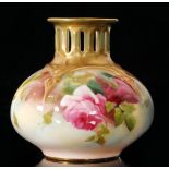 A Royal Worcester Hadleys shape 306 vase of ovoid lobed form with a pierced collar neck,