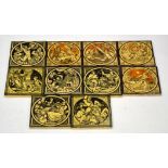 Ten Minton China Works 6" dust pressed tiles decorated with John Moyr Smith designs,