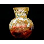 Daum - A small early 20th Century cameo glass vase of spherical form with flared collar,