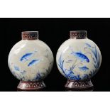 In the manner of Graf Harrach - Harrachov - A pair of moon flask shape vases with splayed foot and