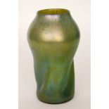 Loetz - A large glass vase with wrythen fluted base below an ovoid shoulder and shallow neck,