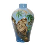 Burmantofts - An early 20th Century Art Pottery vase impasto decorated with a relief moulded monkey