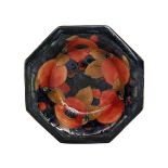 William Moorcroft - Pomegranate - An octagonal dish decorated with a band of open and whole fruits