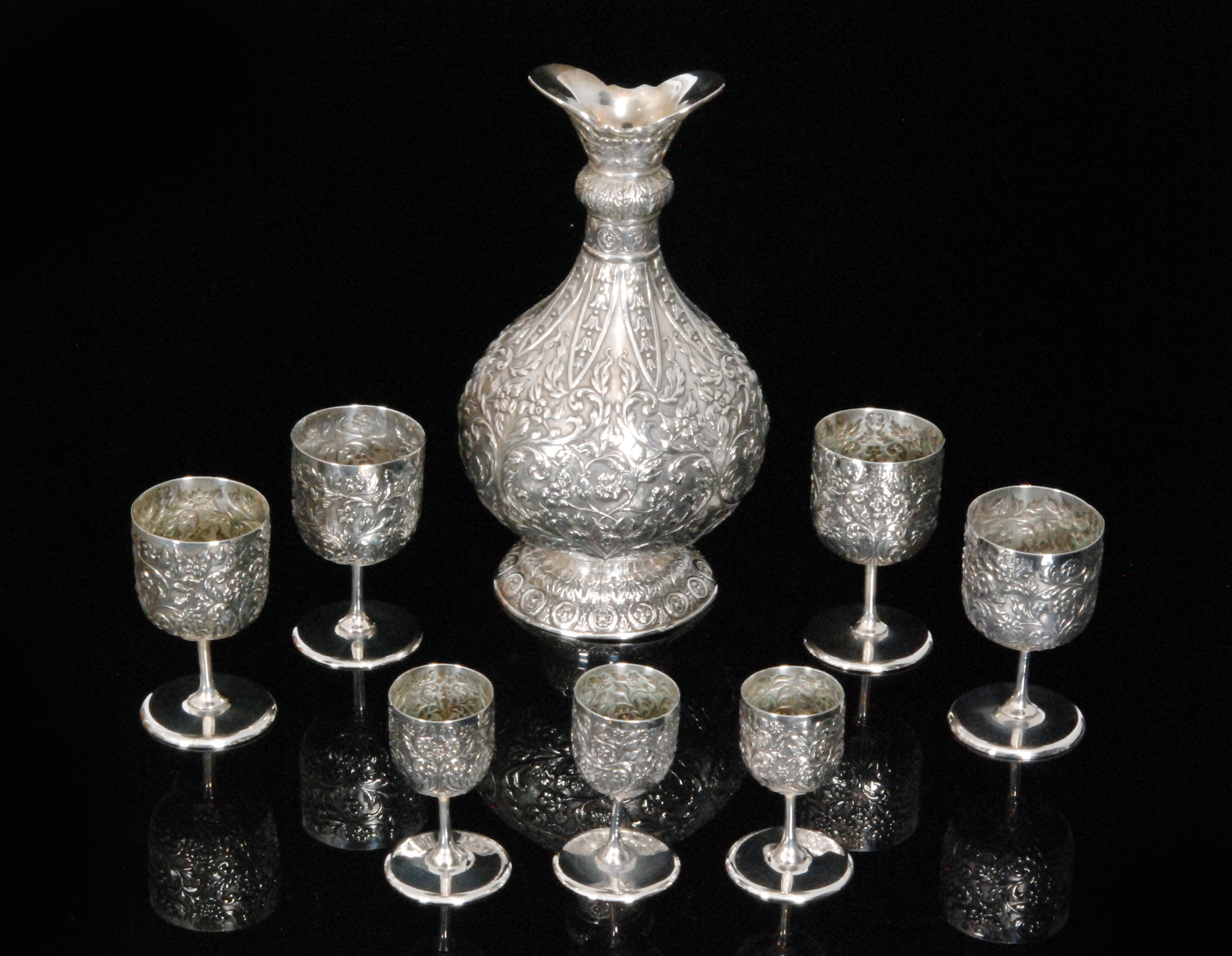 An early 20th Century hallmarked silver decanter set, baluster decanter, height 23cm,