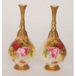 A pair of Royal Worcester vases of globe and shaft form, Hadleys shape 305,