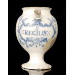 An early 18th Century Delft wet drug jar painted in a pale blue with a cartouche inscribed S REGIUS