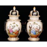 A pair of late 19th Century jar and covers each panel decorated with hand painted Watteauesque