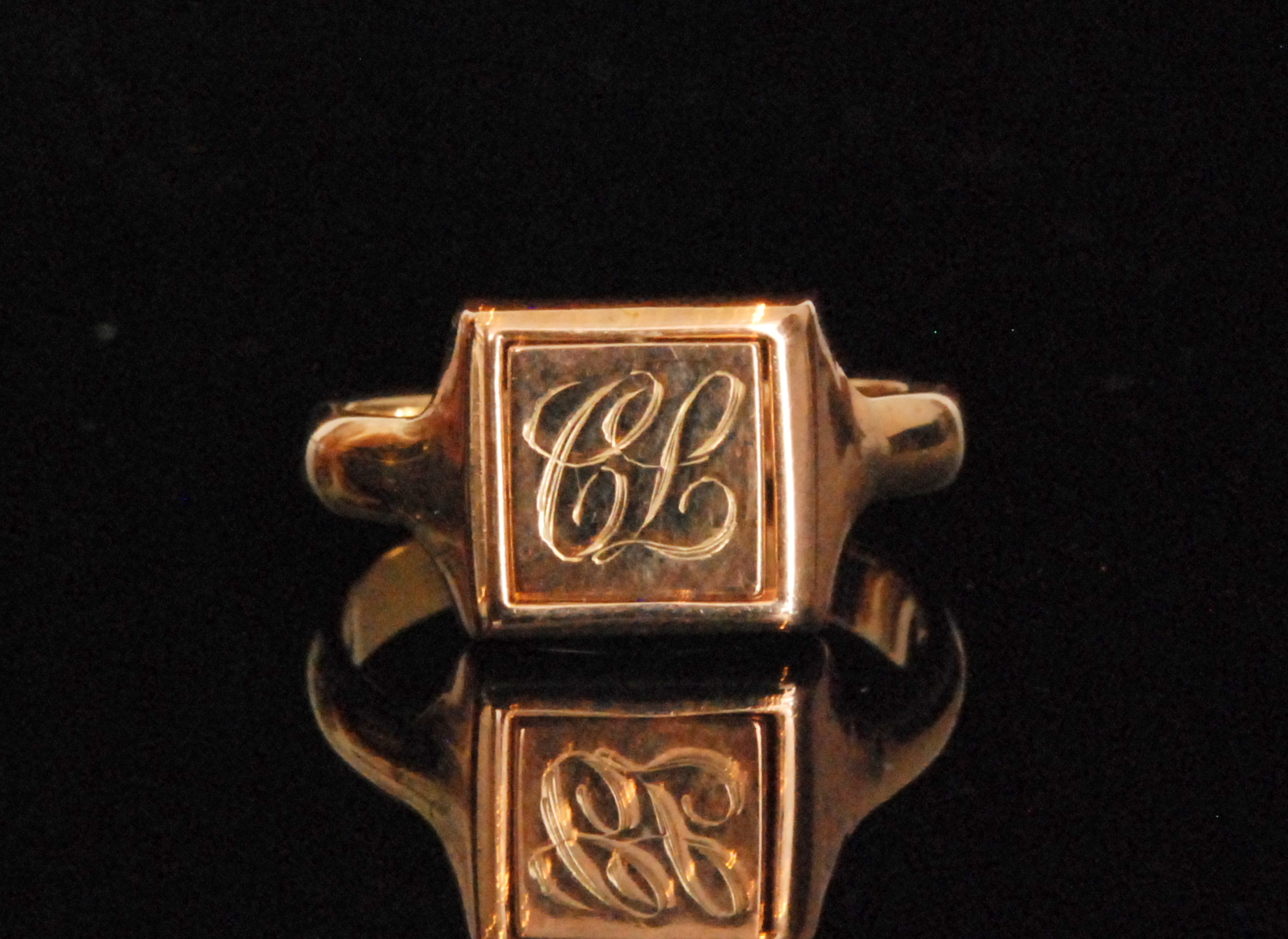 A mid 20th Century Masonic swivel signet ring,