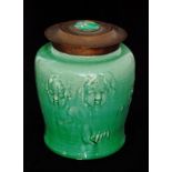 A late 19th Century Royal Doulton vase with a Duchess of Sutherland Cripples Guild copper lid,