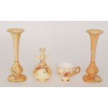 Four pieces of Royal Worcester blush ivory comprising a pair of trumpet posy vases each with