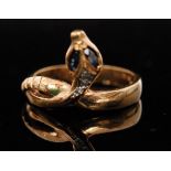 A modern 9ct hallmarked snake ring with sapphire set eyes and three graduating diamonds to head,