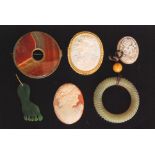 A small parcel lot of jewellery items to include a jade bi disc,