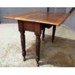 A Victorian mahogany Pembroke table, fitted with a single frieze drawer above turned legs,