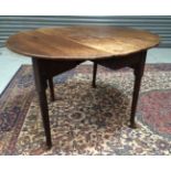 A Georgian oak oval Pembroke table, with plain apron above tapered legs and pad feet, width 96cm.