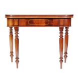 A 19th Century mahogany fold-over tea table of rounded rectangular form,