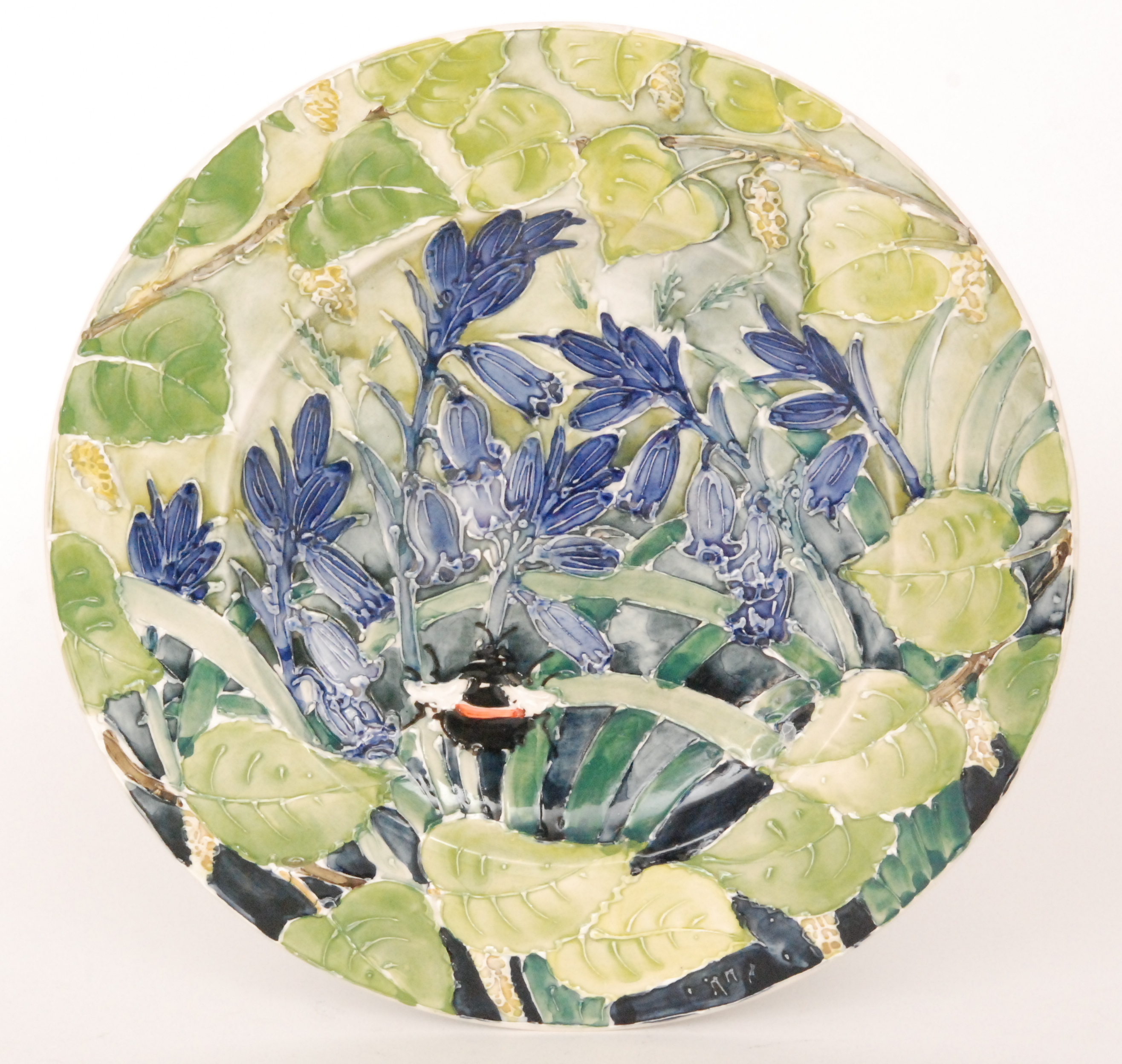 A contemporary Jonathan Cox studio pottery charger entitled Spring,