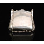 An early 20th Century hallmarked silver lady's evening bag of plain square purse shaped outline,