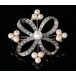 A Edwardian style silver gilt seed pearl and diamond set open work brooch,