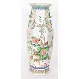 A large 20th Century Chinese floor vase decorated with chickens amidst chrysanthemum and blossom