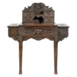An early 20th Century oak writing desk,