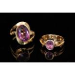 A 15ct amethyst dress ring, the S shaped head united by an oval facet cut collar set amethyst,