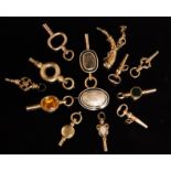 A small parcel lot of assorted 19th Century watch keys to include three stone set examples,