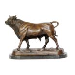 After the antique - A 20th Century bronze model of a bull on black veined marble base,