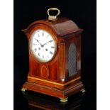 An early 20th Century mahogany eight-day bracket clock in the Georgian style,