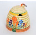 A large Clarice Cliff Crocus Beehive honey pot circa 1930 hand painted with crocus sprays between