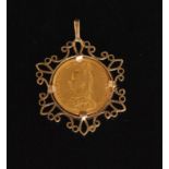 A Victorian jubilee head full sovereign dated 1888 claw set to a 9ct pendant mount,