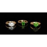Three hallmarked 9ct dress rings, all QVC to include an emerald cut aquamarine three stone ring,