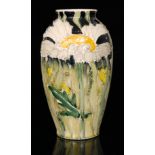 A contemporary Jonathan Cox studio pottery vase decorated with tubelined daisies and foliage,