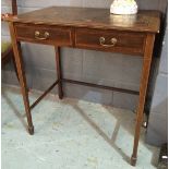 An Edwardian satinwood cross-banded mahogany two drawer writing table of small proportions,