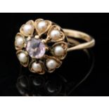 A 9ct hallmarked amethyst and split pearl circular cluster ring,