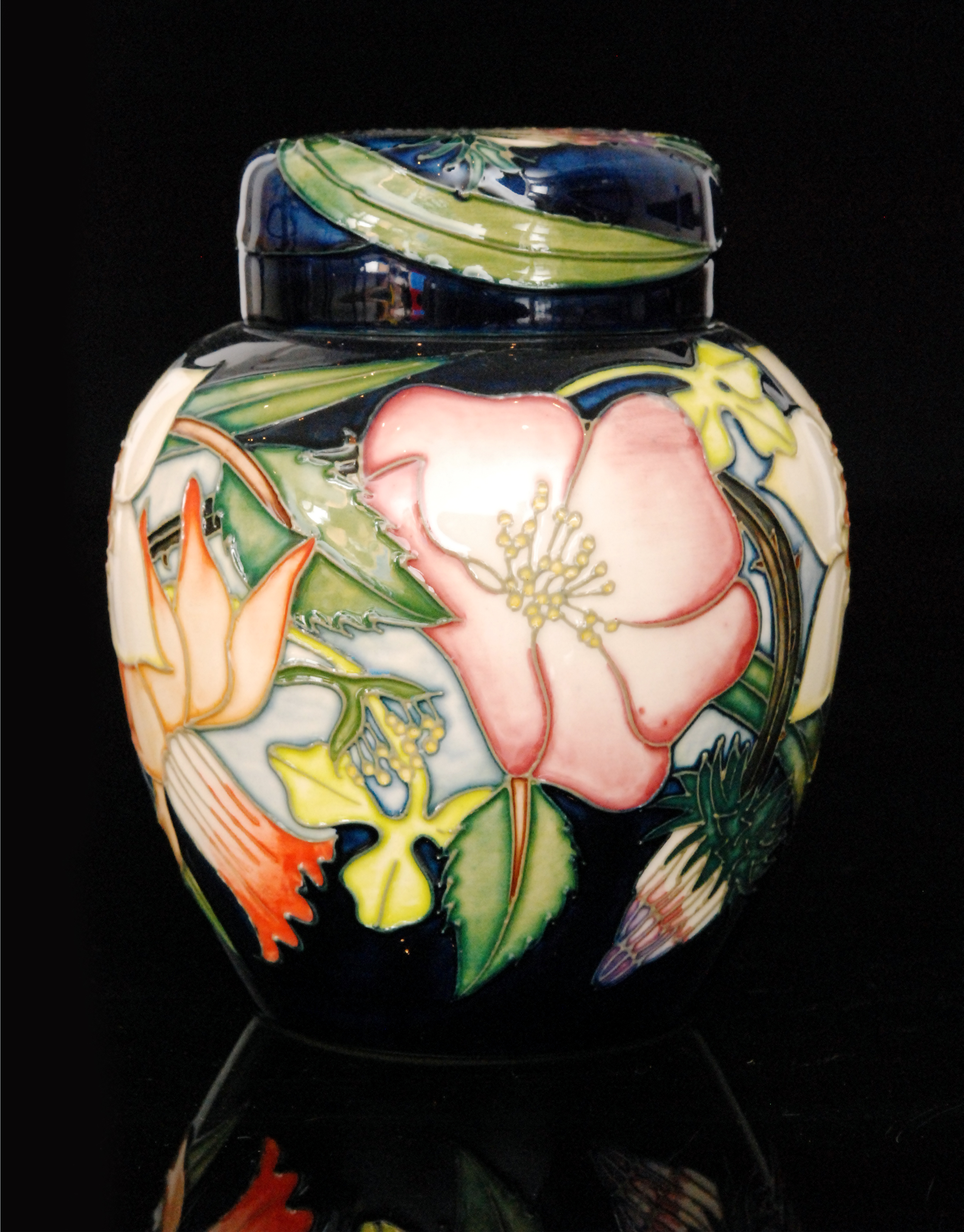 A Moorcroft Pottery ginger jar and cover decorated in the Golden Jubilee pattern,