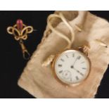 A gold plated lady's open faced fob watch,