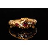 An early 20th Century 18ct hallmarked ruby and diamond five stone, boat shaped ring,