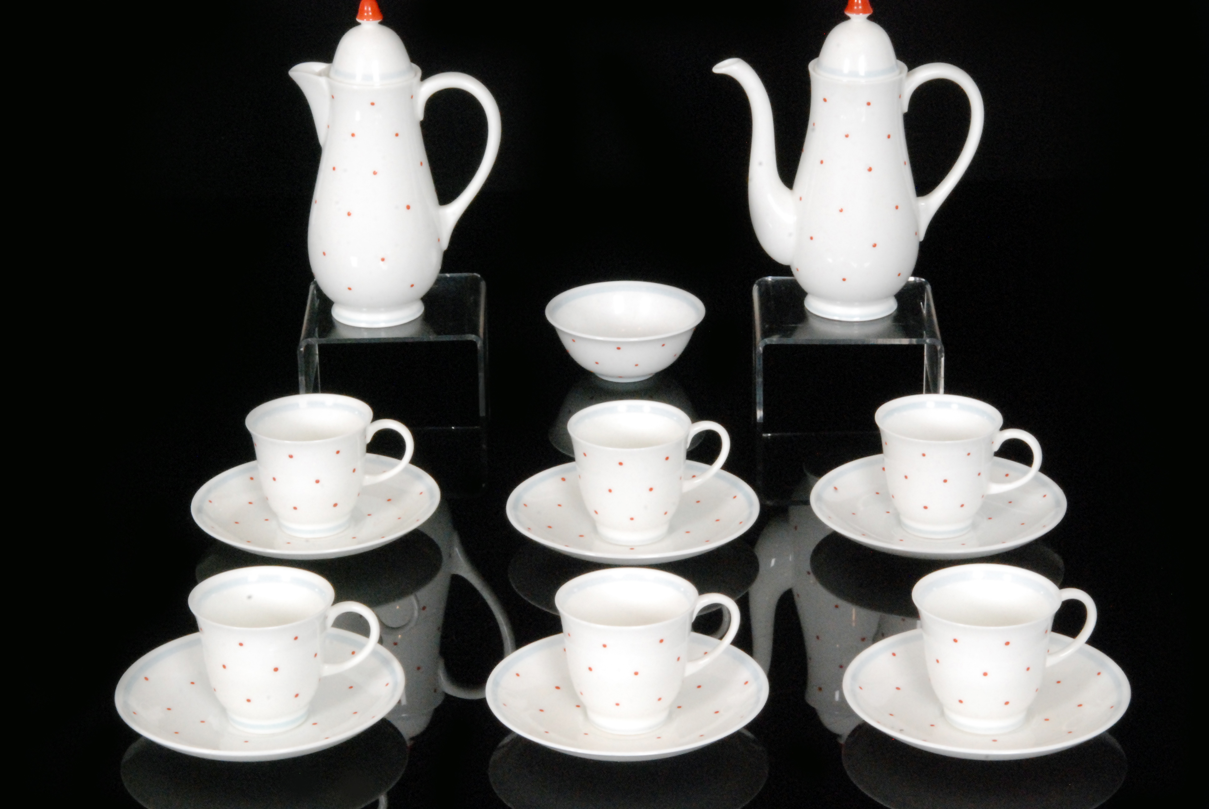 A bone china Susie Cooper coffee set comprising coffee pot, six cups and saucers,