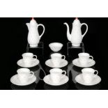 A bone china Susie Cooper coffee set comprising coffee pot, six cups and saucers,